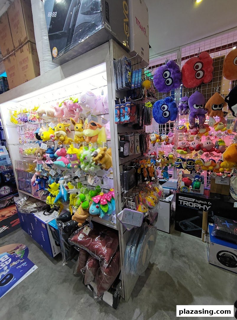 Shelves filled with gaming plushies, collectibles, and accessories inside GameMartz Plaza Sing.