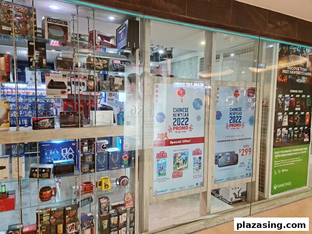 The storefront of GameMartz Plaza Sing, showcasing gaming consoles, accessories, and Chinese New Year promotions.