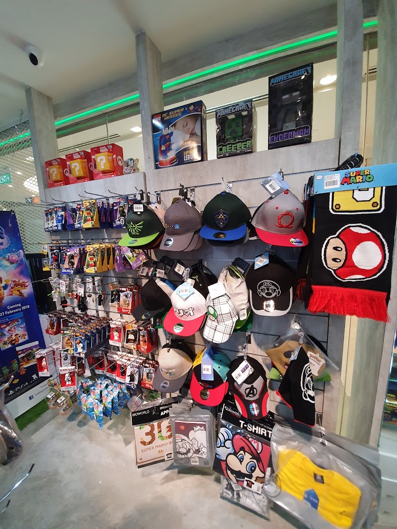A vibrant display of gaming merchandise, including hats, apparel, and accessories, featuring popular characters.