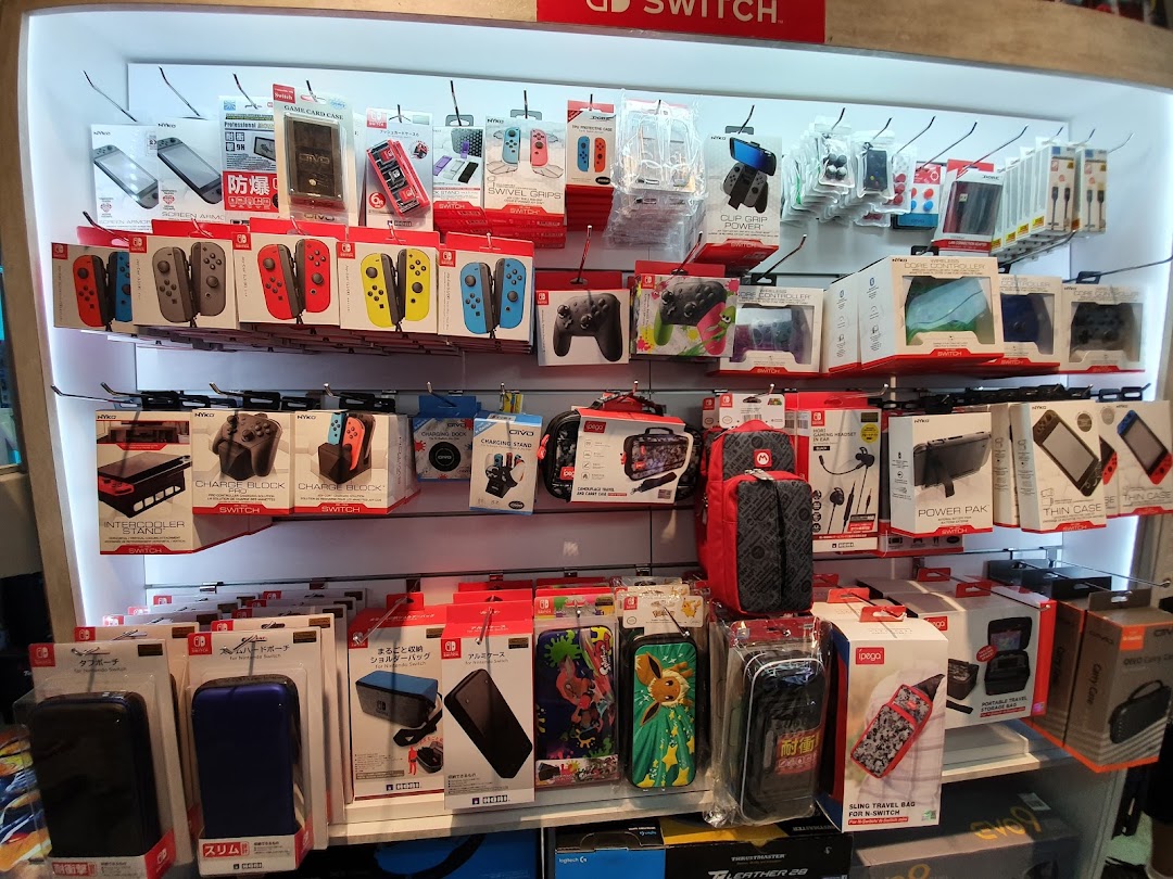 A vibrant display wall showcasing a wide array of Nintendo Switch gaming accessories and peripherals.