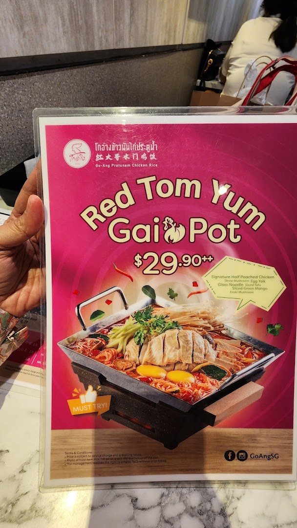 A menu page featuring the 'Red Tom Yum Gai Pot' dish with its price and ingredients.