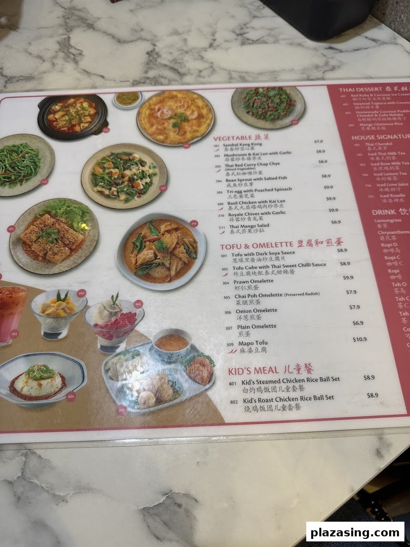A detailed close-up of a restaurant menu featuring various Thai dishes, desserts, and drinks.