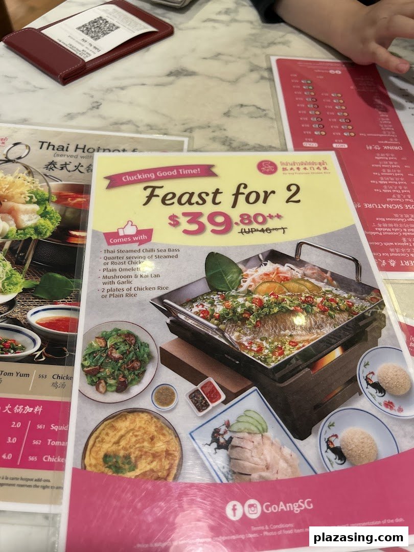 A menu display featuring the 'Feast for 2' set meal with various Thai dishes and other menu sections.