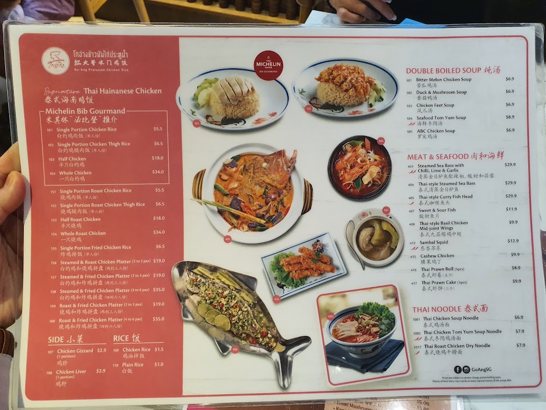 A detailed menu from Go-Ang Pratunam Chicken Rice, featuring Thai Hainanese chicken and other authentic dishes.