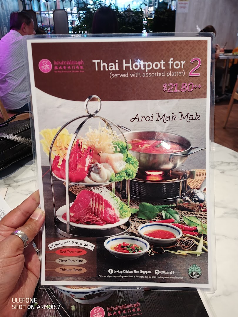 A menu displaying a Thai Hotpot for two with an assorted platter and soup base choices.