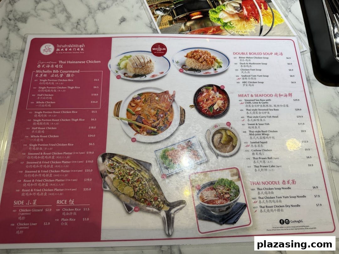 A detailed menu from Go-Ang Pratunam Chicken Rice, featuring Thai Hainanese chicken, soups, seafood, and noodles.