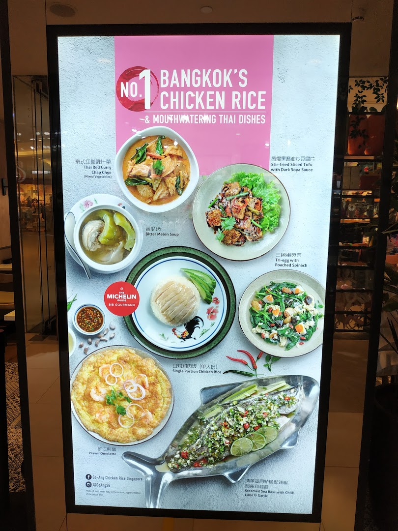 A vibrant display board showcasing Go-Ang Pratunam Chicken Rice's signature dishes and Thai specialties.