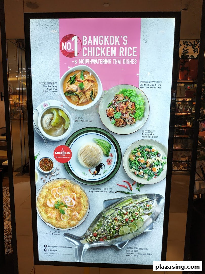 A vibrant display board showcasing Go-Ang Pratunam Chicken Rice's signature dishes and Thai specialties.