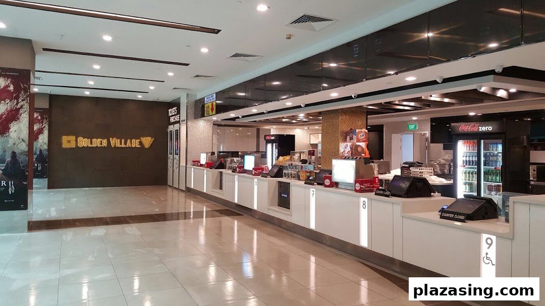 Interior view of Golden Village Plaza cinema lobby with ticket and concession counters.