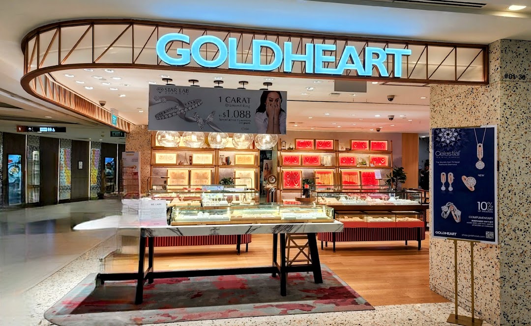The Goldheart Jewelry shop front showcases sparkling diamond and gold collections in elegant display cases.