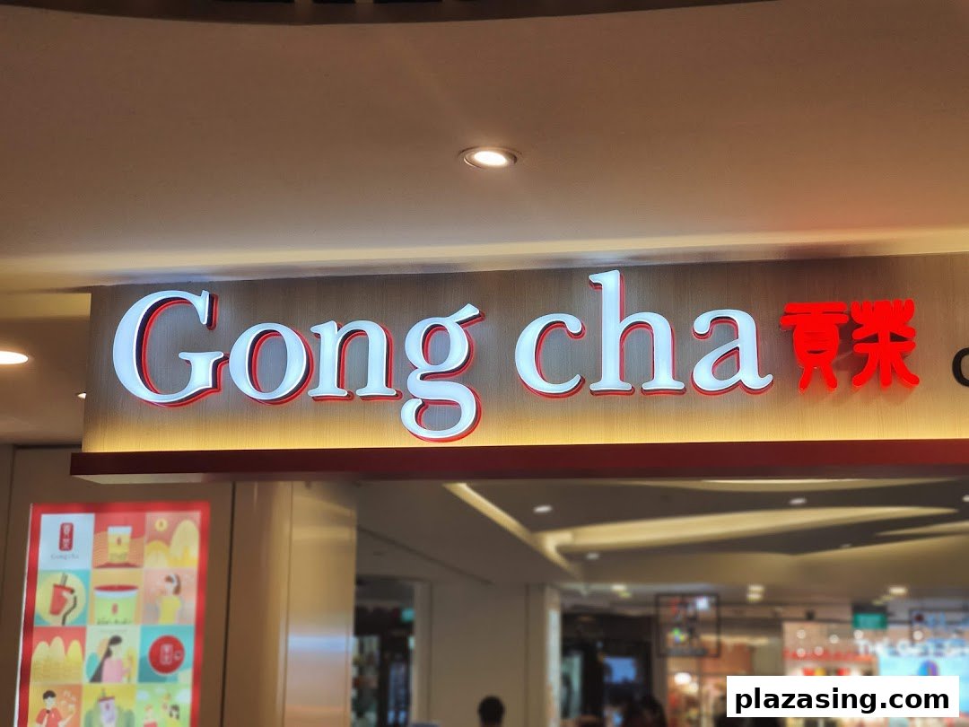 Close-up of the illuminated Gong Cha shop front sign in a shopping mall.