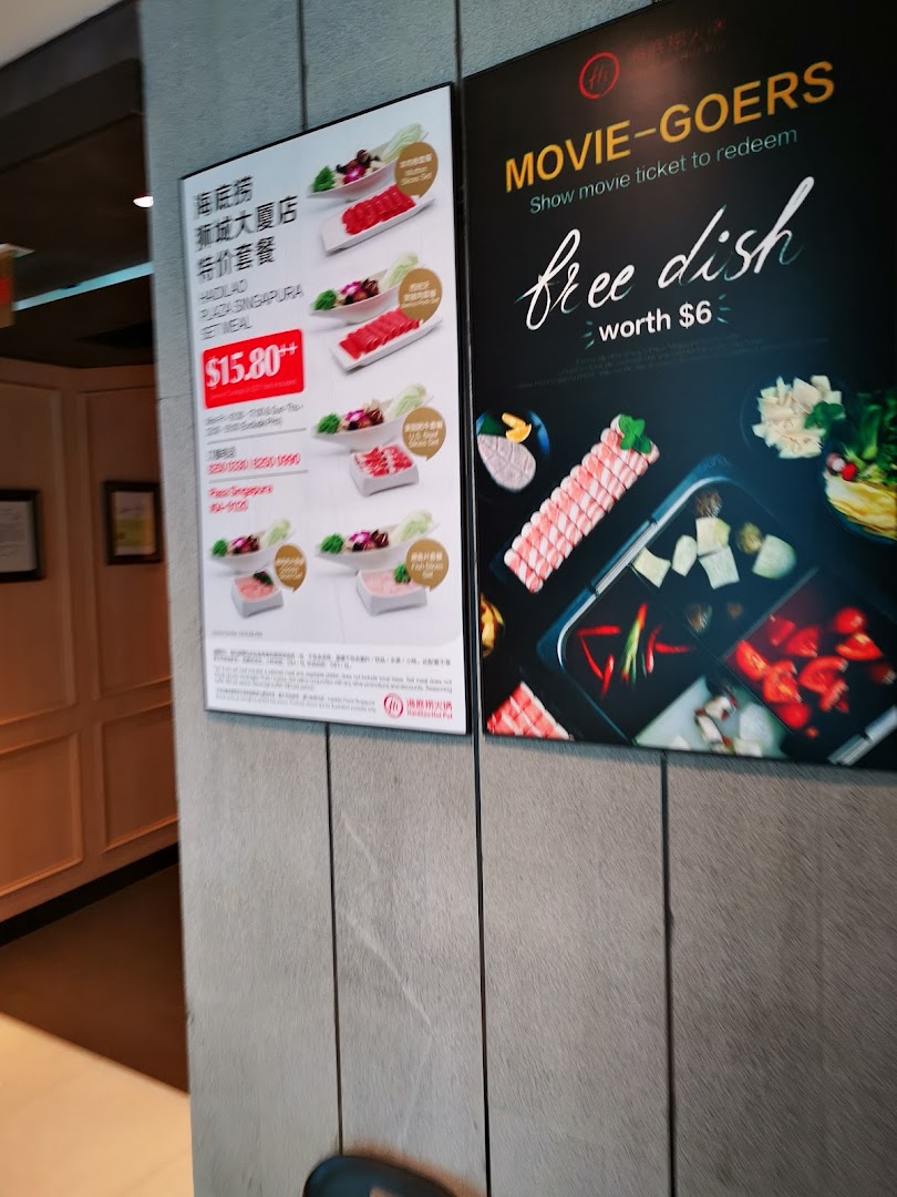 Promotional posters at Haidilao Hot Pot featuring a set meal offer and a movie-goer discount.