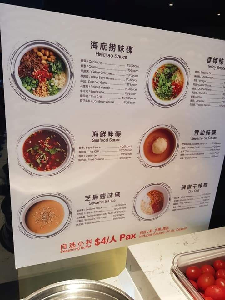 A display board showcasing Haidilao's customizable hot pot sauce bar options and pricing.