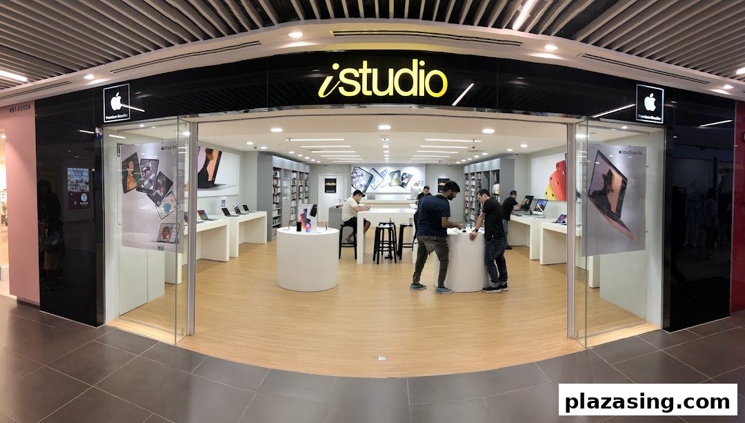 The iStudio shop front at Plaza Singapura, an Apple Premium Reseller, showcasing Apple products.