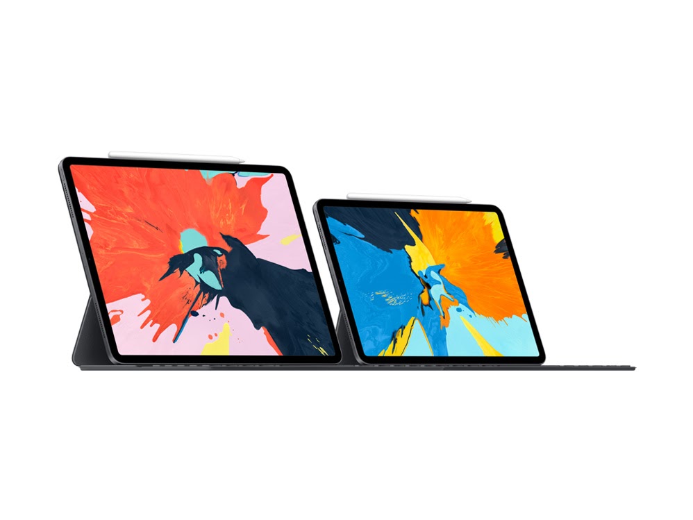 Two Apple iPads with Apple Pencils, showcasing vibrant displays on a white background.
