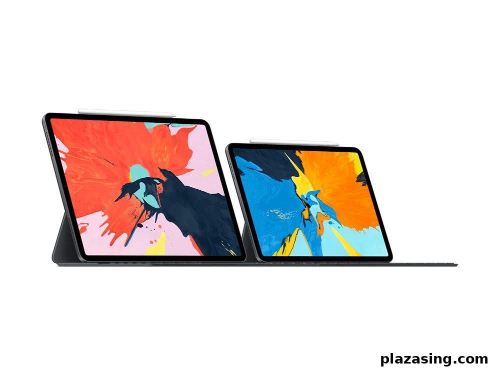 Two Apple iPads with Apple Pencils, showcasing vibrant displays on a white background.