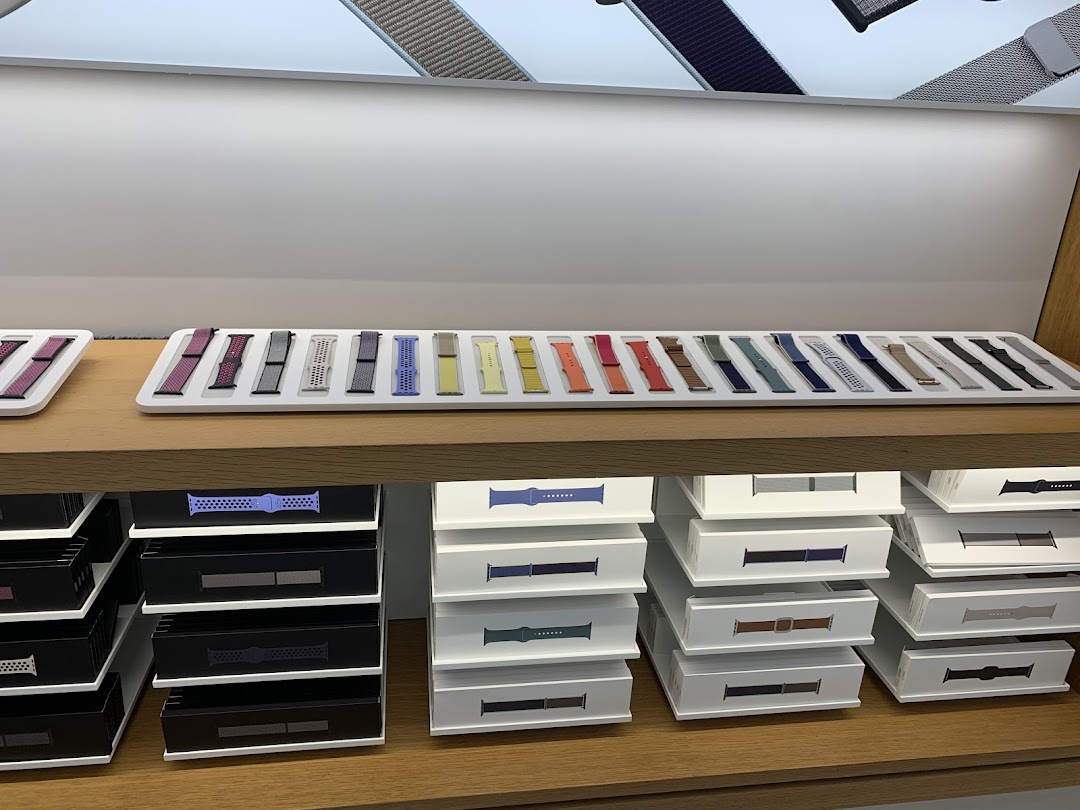 A vibrant display of Apple Watch bands in various colors and styles at iStudio.