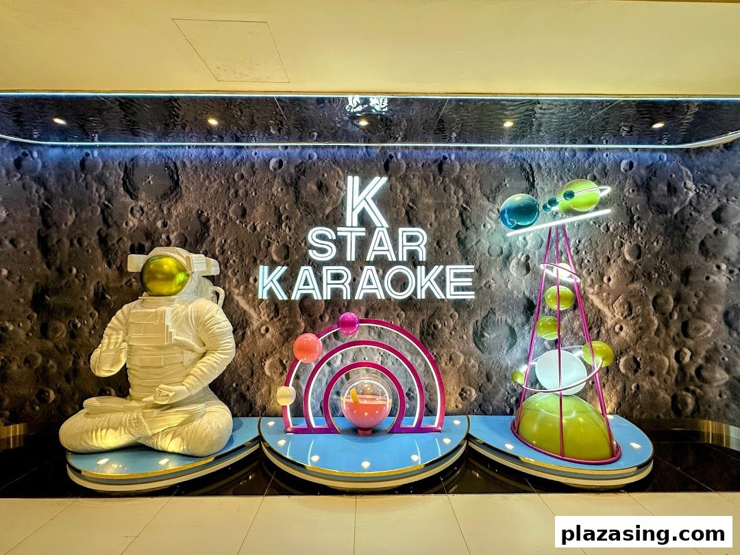 The K.STAR Karaoke shop front features a space-themed design with an astronaut and planets.