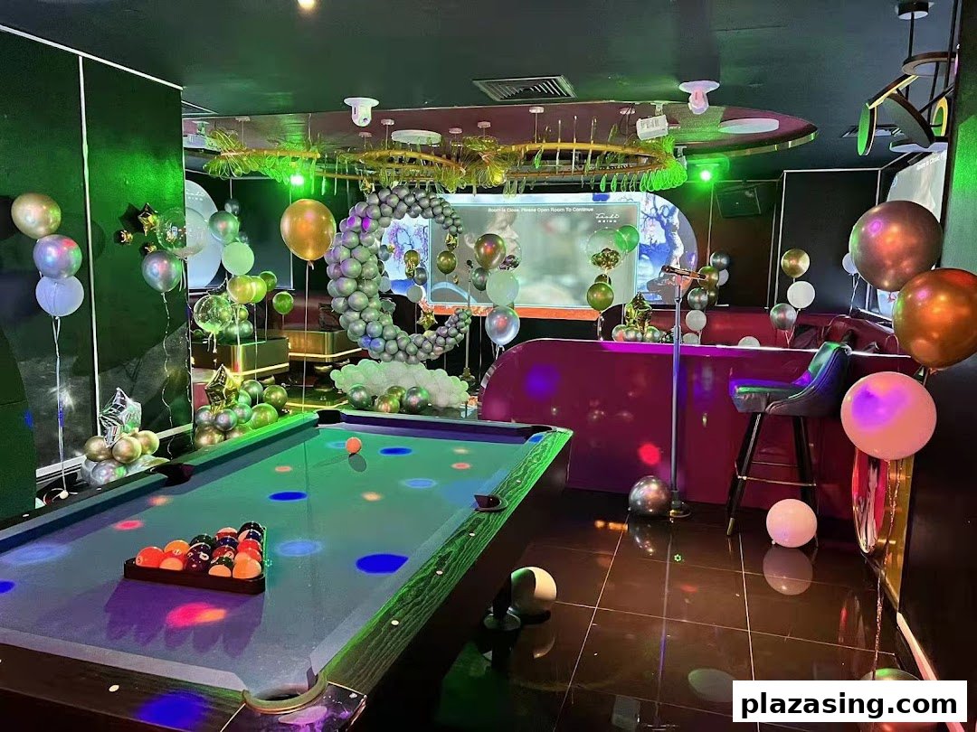 A vibrant KTV room with a pool table, colorful lighting, and festive balloon decorations.