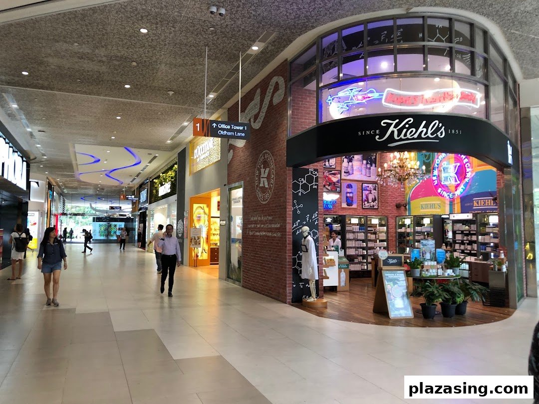 The Kiehl's shop front in Plaza Singapura, showcasing its inviting entrance and product displays.