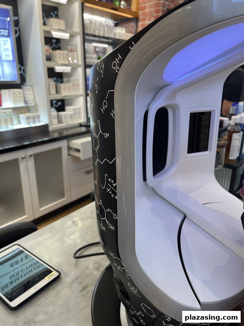 Close-up of a skin analysis device at Kiehl's, with product shelves visible in the background.