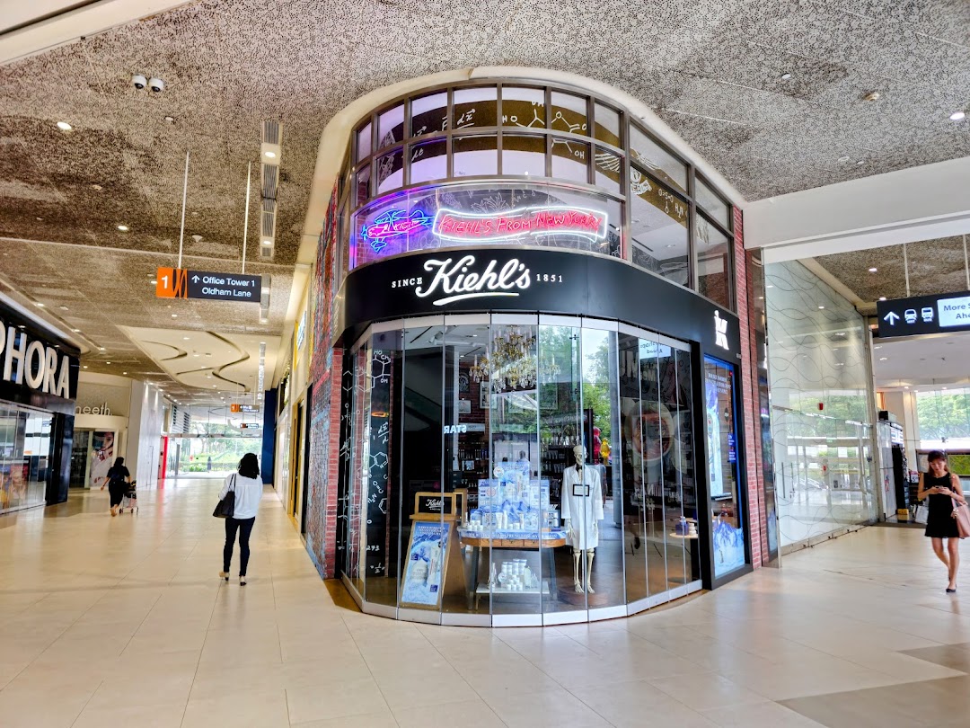 The Kiehl's shop front at Plaza Singapura, showcasing its distinctive entrance and product displays.