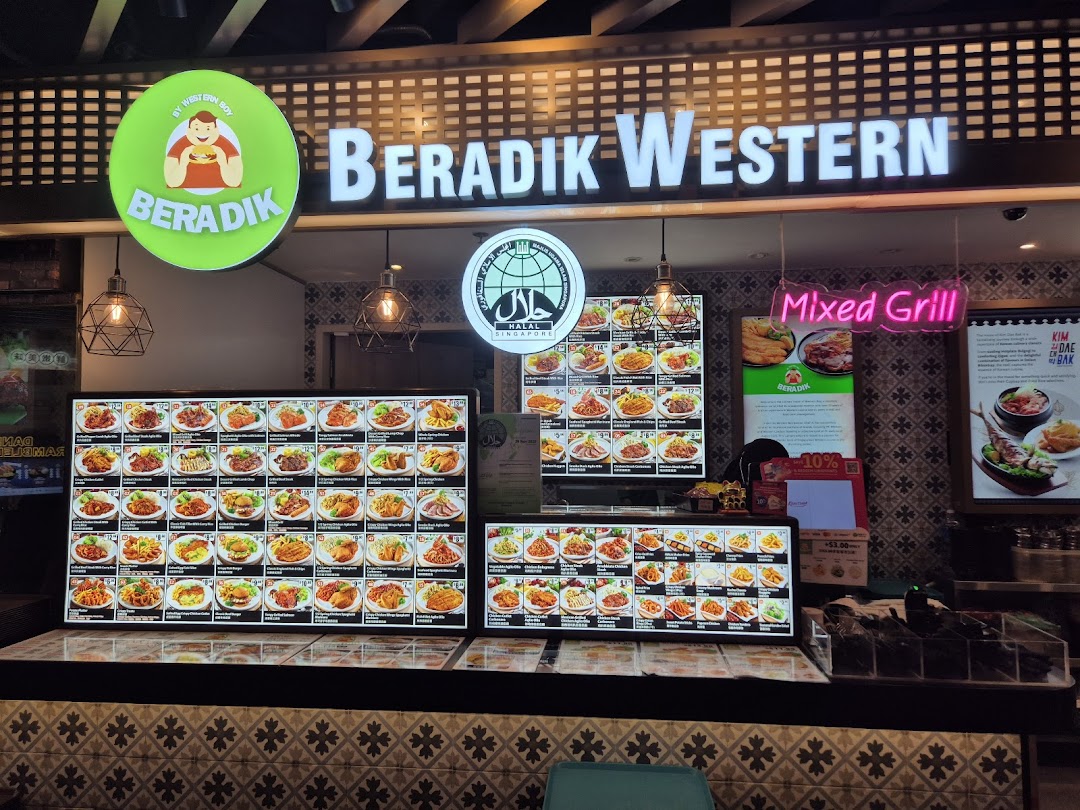 A brightly lit food stall named Beradik Western showcasing numerous menu items on digital displays.