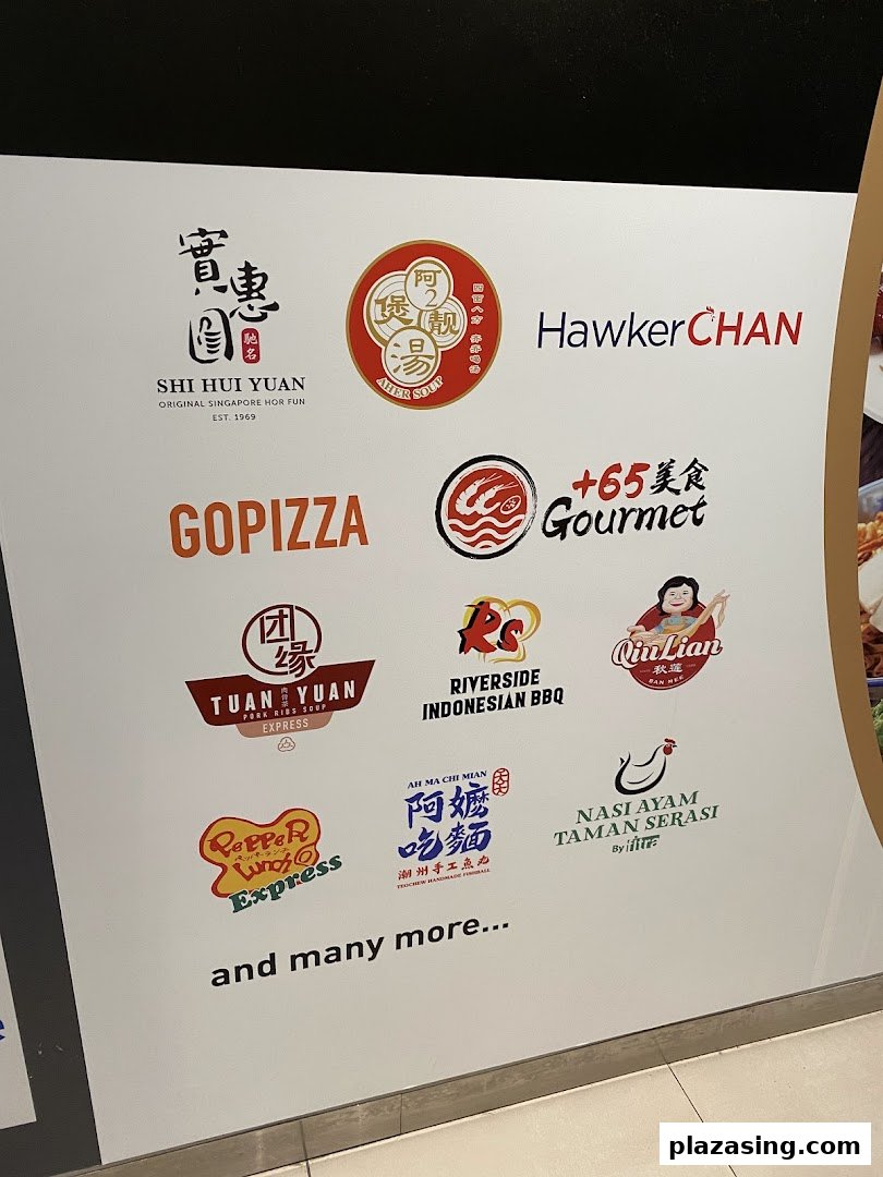 A sign displaying logos of various food vendors available at Kopitiam Food Hall.