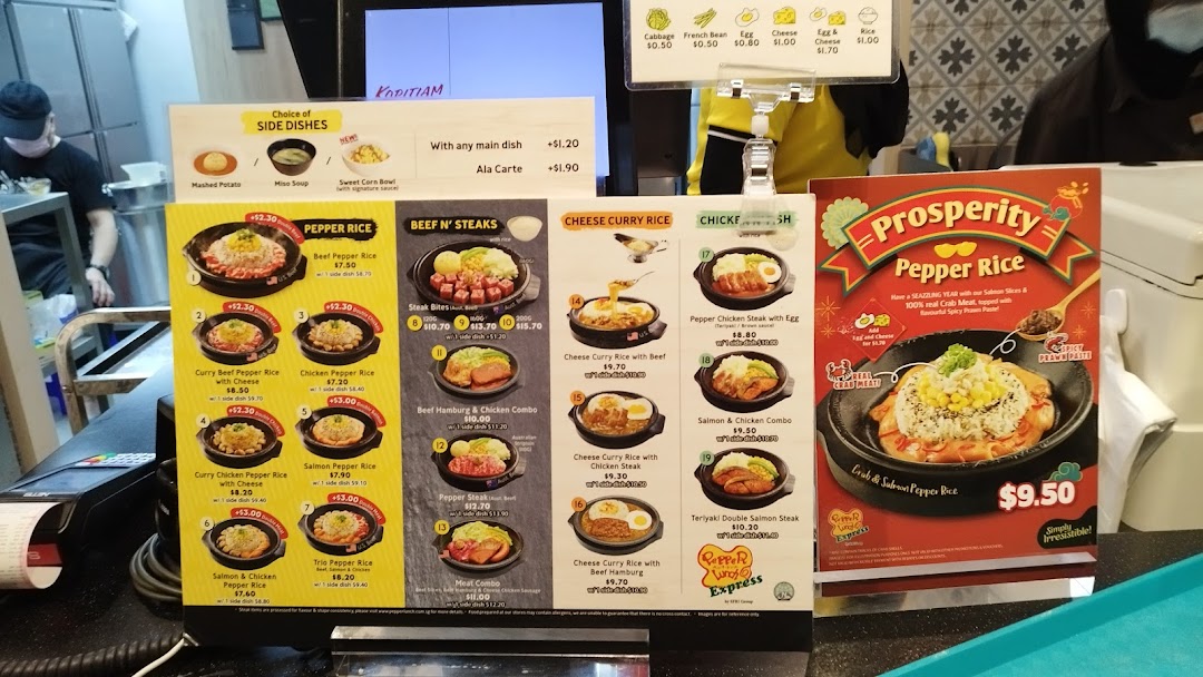 A vibrant display of hot plate menus featuring Pepper Rice, steaks, and cheese curry dishes.