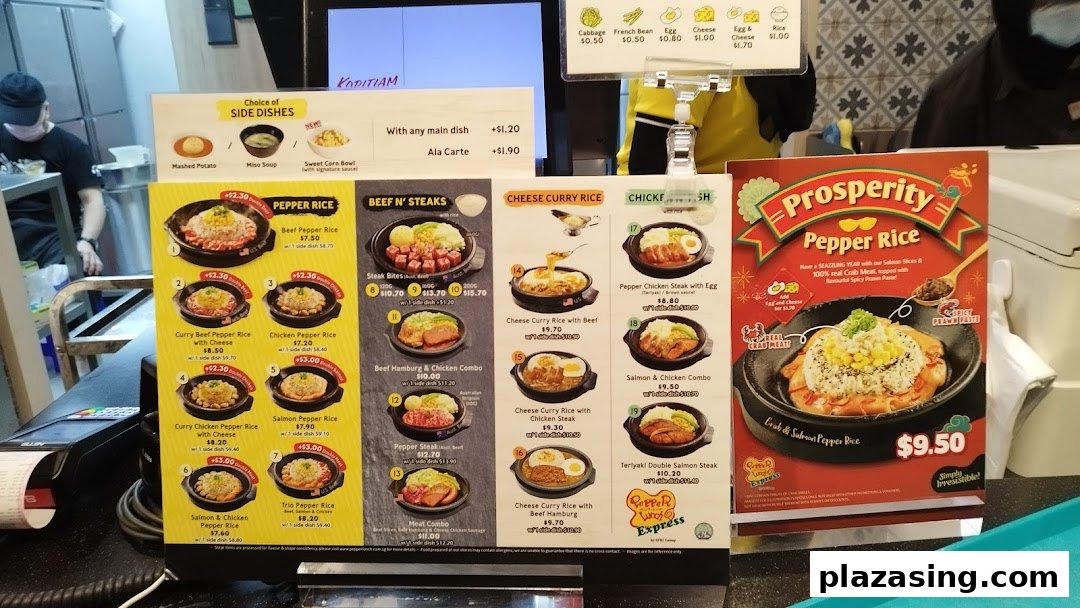 A vibrant display of hot plate menus featuring Pepper Rice, steaks, and cheese curry dishes.