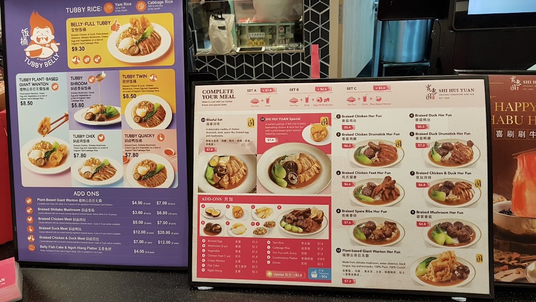 Two vibrant menu boards showcasing a variety of traditional Asian rice and hor fun dishes with add-ons.