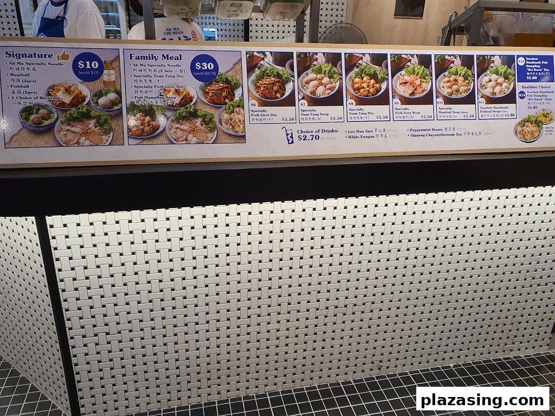 A vibrant menu board showcasing various noodle dishes, soups, and beverages with prices.
