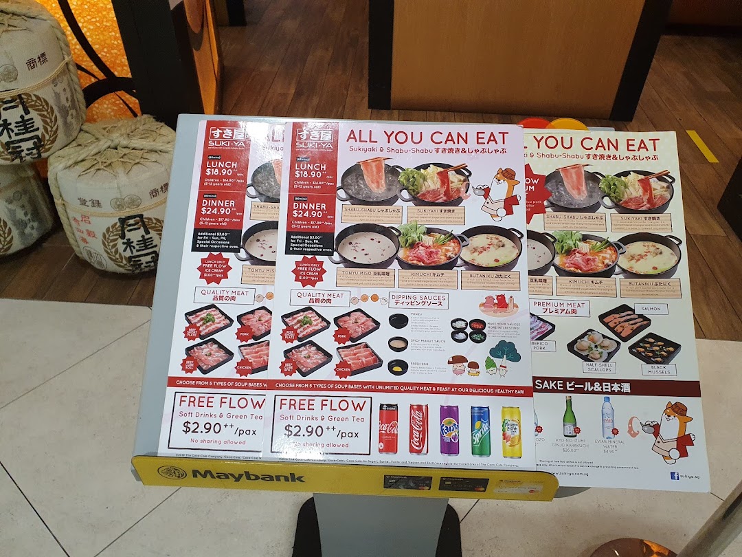 A detailed menu board for SUKI-YA, showcasing all-you-can-eat hotpot options, meats, and drinks.