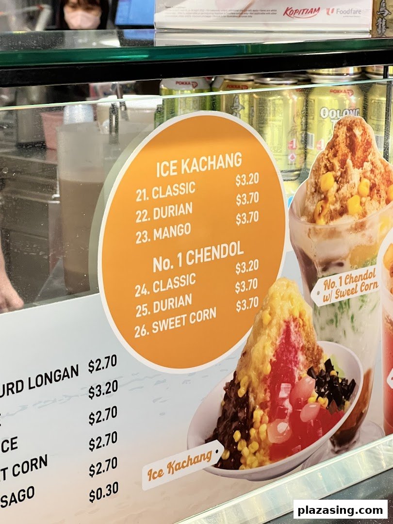 A menu board displaying prices and varieties of Ice Kachang and Chendol, with images of the desserts.