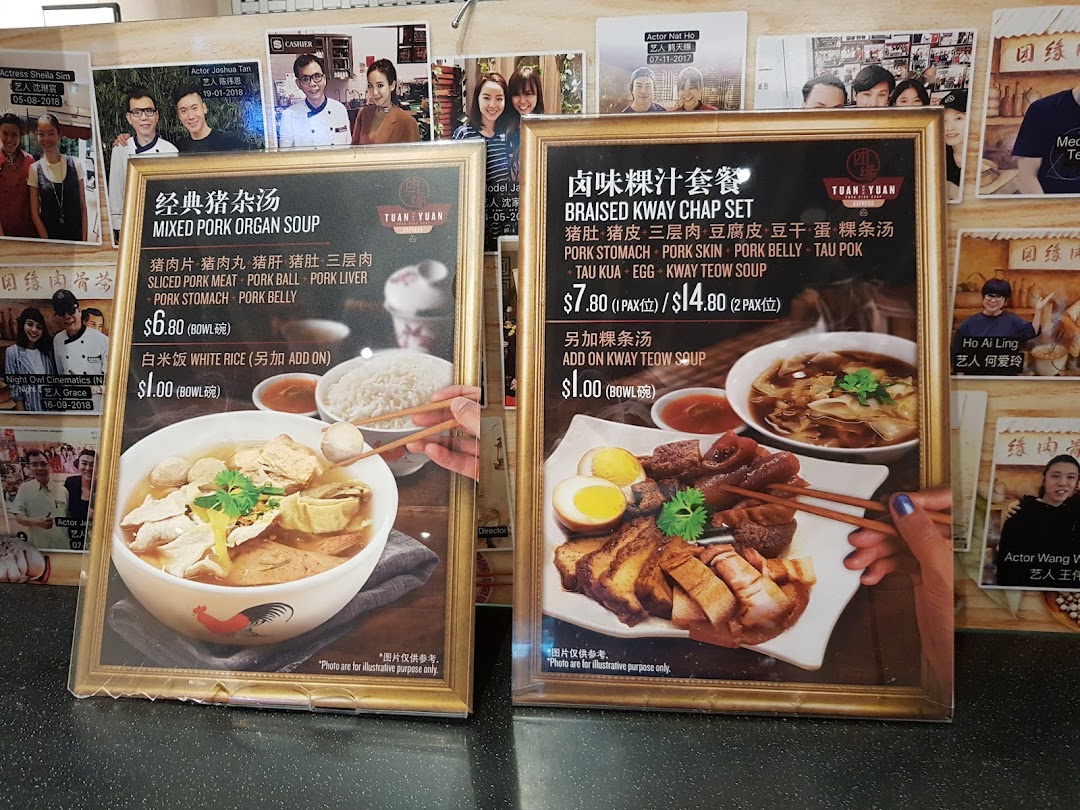 Two menu boards from Tuan Yuan showcasing traditional Mixed Pork Organ Soup and Braised Kway Chap Set.