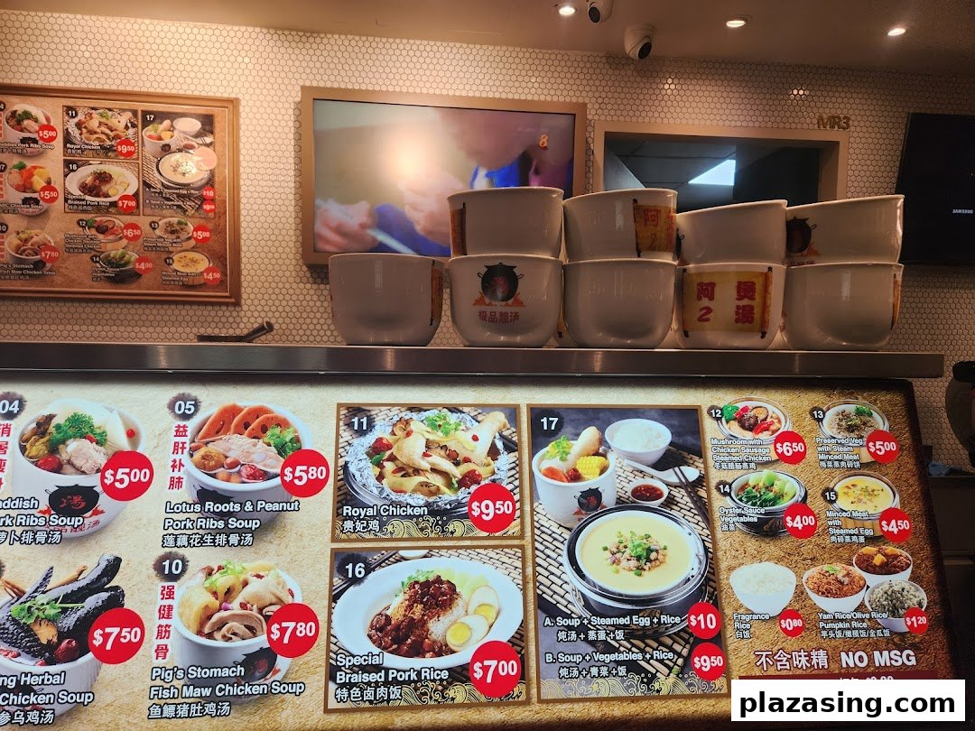 A vibrant menu board showcasing a variety of traditional Chinese soups and dishes with prices.