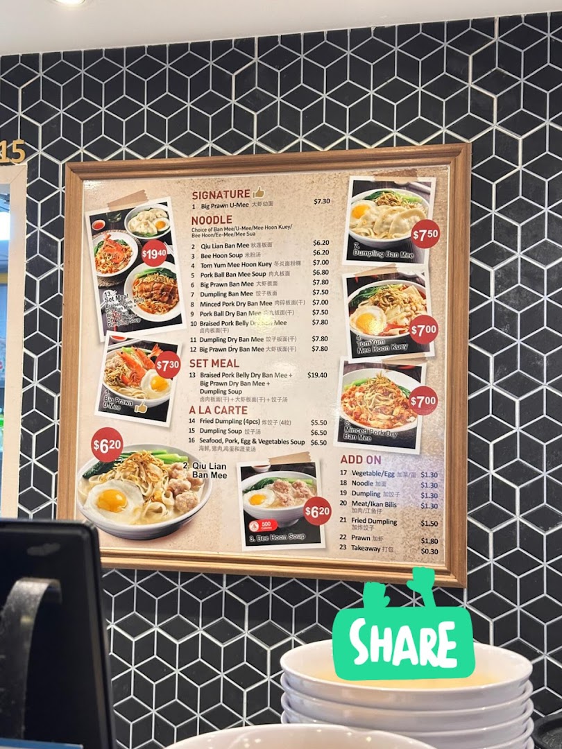 A detailed menu board for Kopitiam Food Hall, showcasing various noodle dishes, set meals, and add-ons.