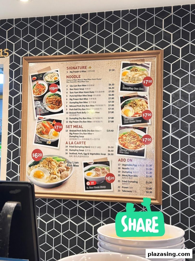 A detailed menu board for Kopitiam Food Hall, showcasing various noodle dishes, set meals, and add-ons.