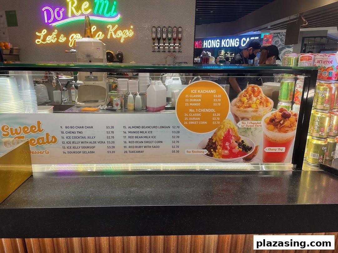 A vibrant dessert counter featuring a menu board with various sweet treats and shaved ice desserts.