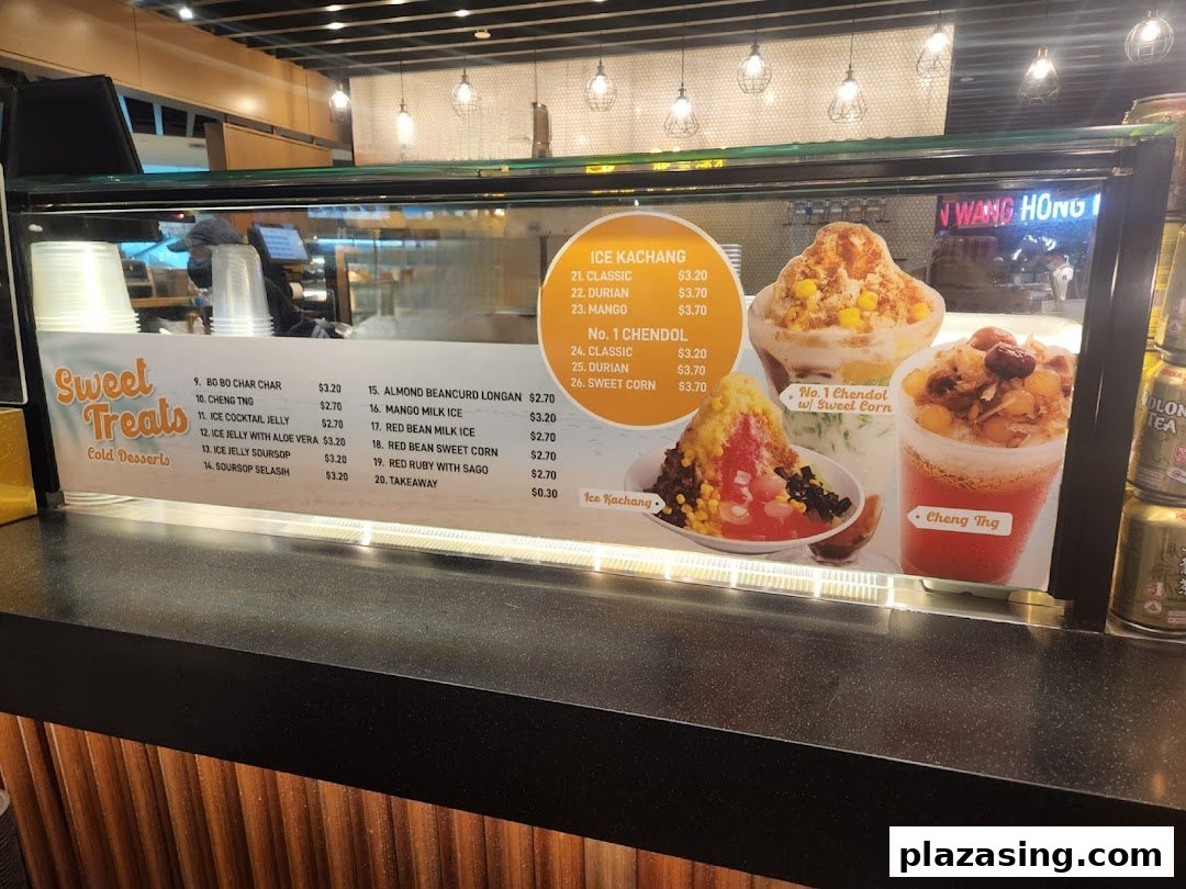 A display counter showcasing a variety of refreshing Asian cold desserts and their prices.