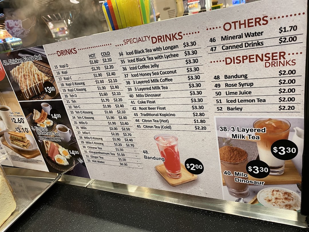 A detailed menu board displaying a variety of drinks and breakfast sets with prices.