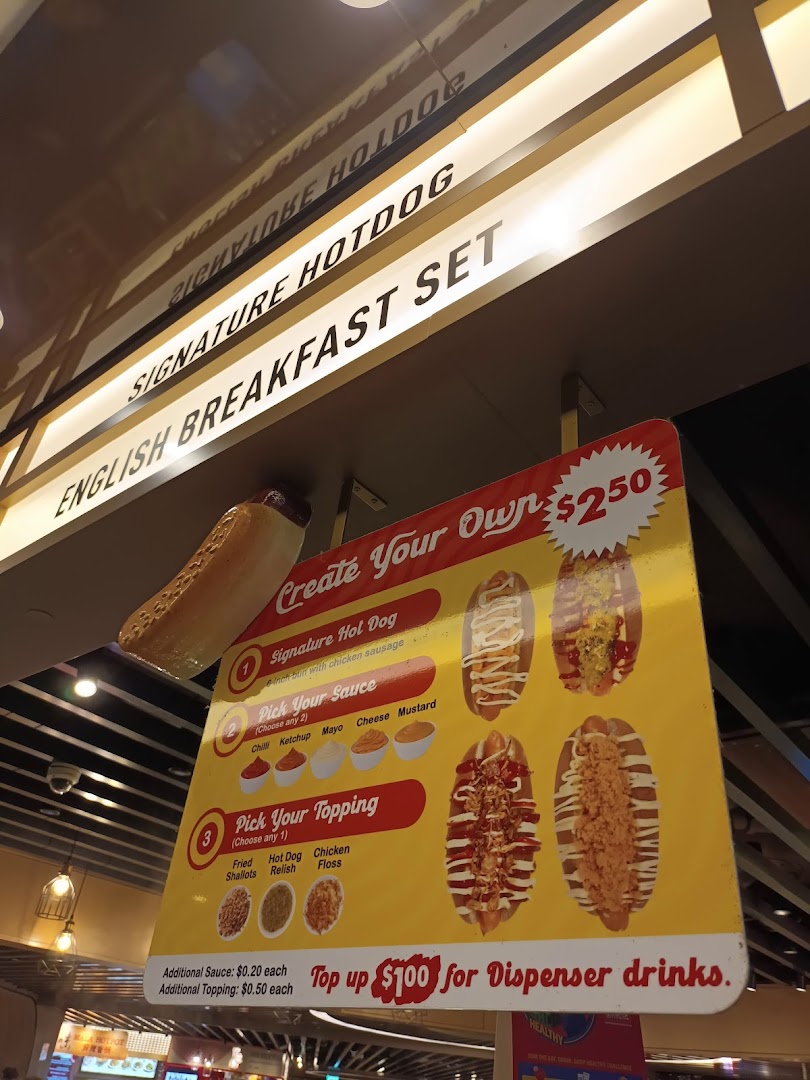 A menu board for 'Create Your Own' hotdogs with customization options and pricing.