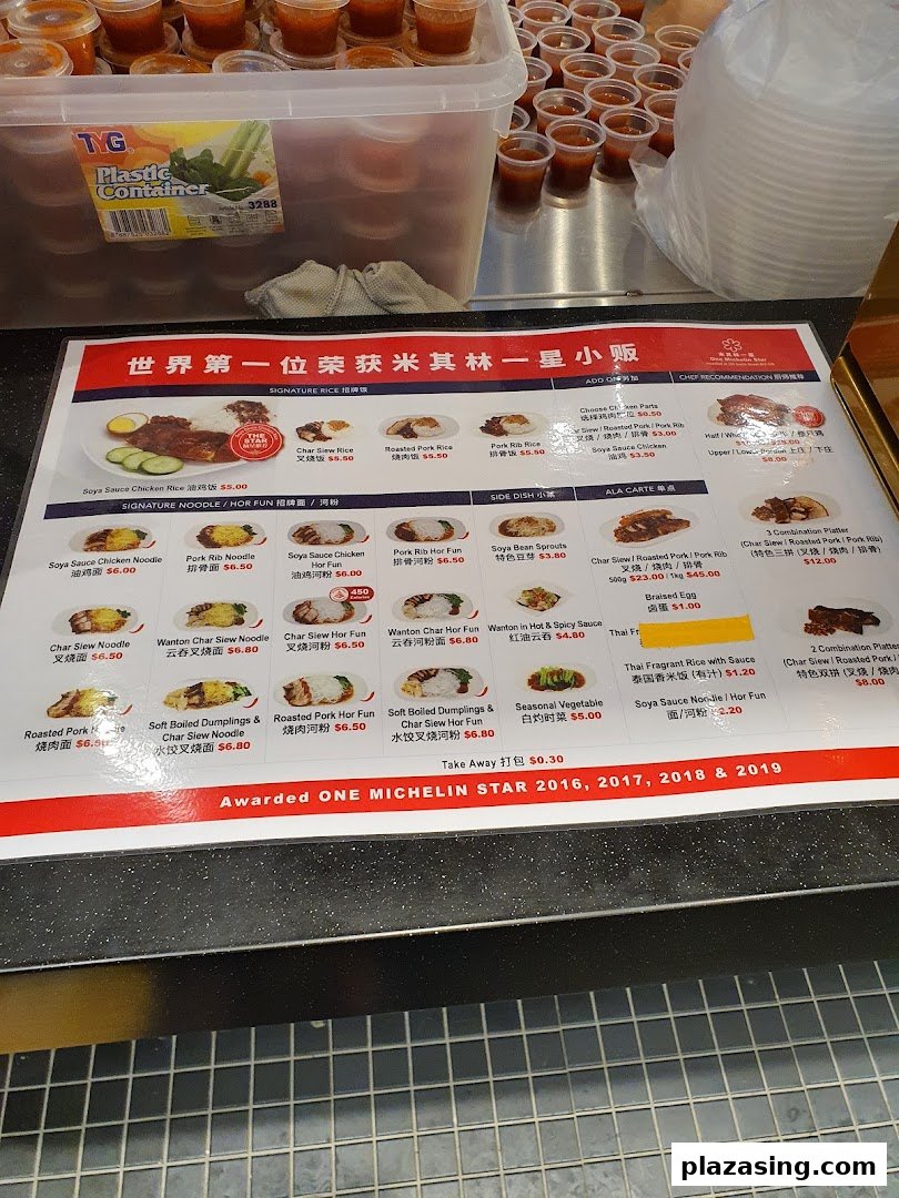 A detailed menu board displaying various rice, noodle, and side dishes with prices at Kopitiam Food Hall.