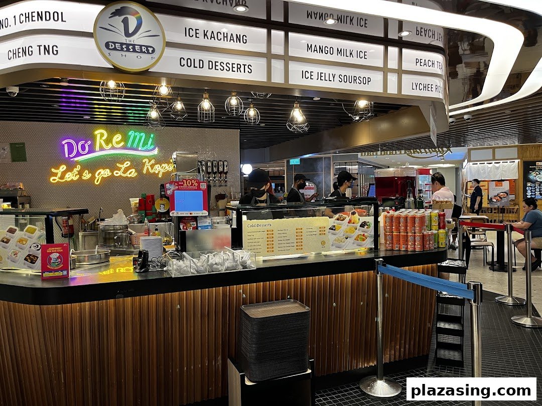 A vibrant dessert stall named Do Re Mi The Dessert Shop, showcasing its menu and cold treats.