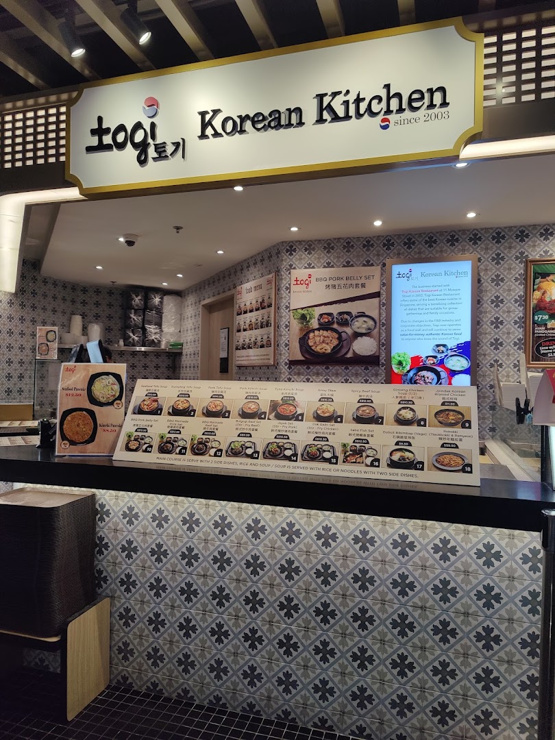 Interior view of ToGi Korean Kitchen stall within Kopitiam Food Hall, featuring menu displays and counter.