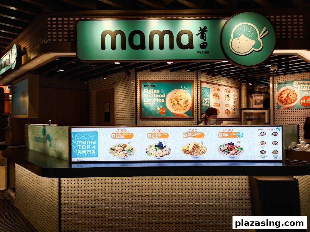 A food stall named 'mama' in Kopitiam Food Hall, featuring digital menu displays with various Fujian dishes.