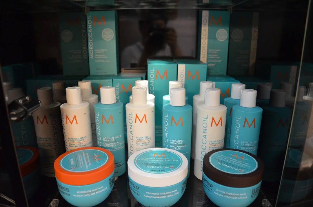 A vibrant display of Moroccanoil hair care products, including shampoos, conditioners, and masks.