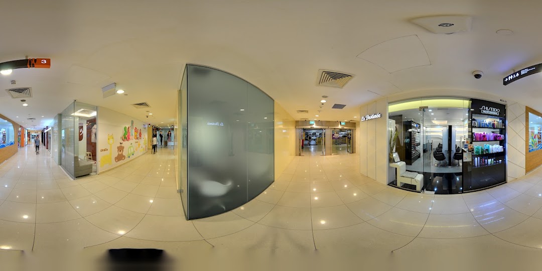 The shop front of Le Destinee, a hair and beauty salon, within a brightly lit mall corridor.