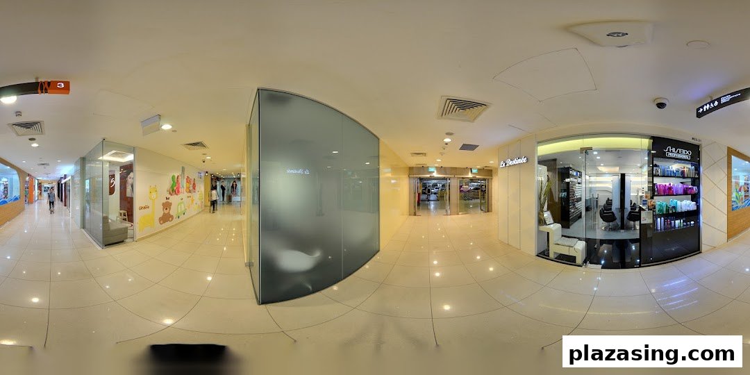 The shop front of Le Destinee, a hair and beauty salon, within a brightly lit mall corridor.