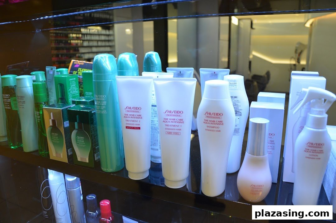 A display of Shiseido professional hair care products, including shampoos and treatments, on a retail shelf.